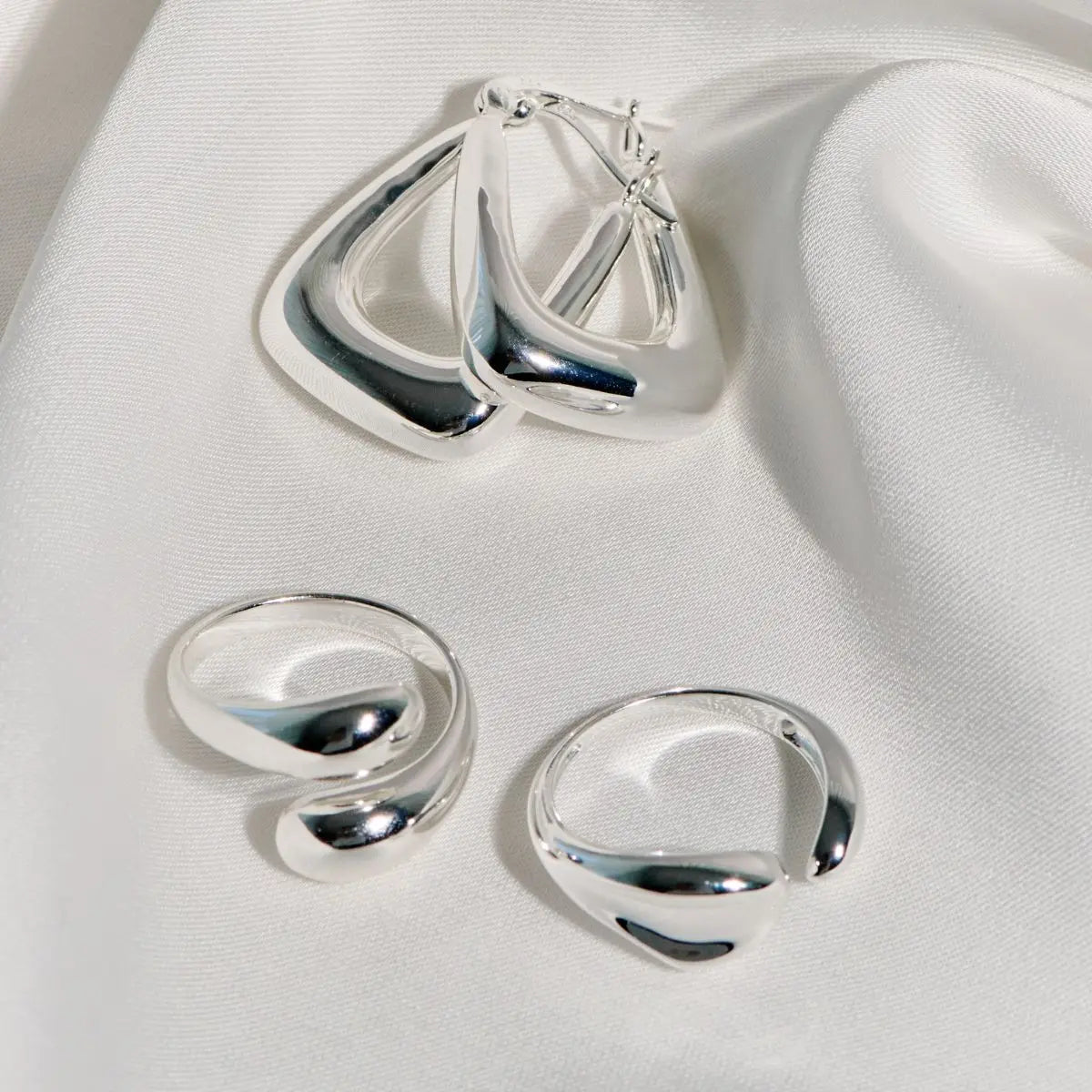 Polished Silver Handbag Hoop Earrings Silver 1 - on lay Australian Jewellery Brand Bowerbird Jewels
