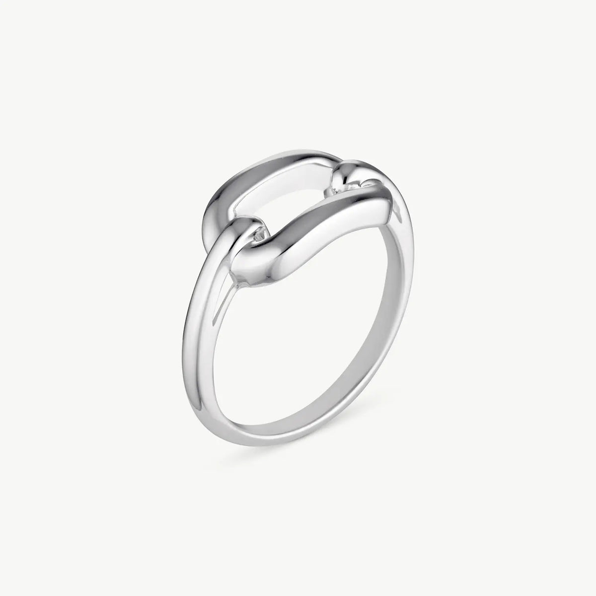 A polished silver ring with a unique interlocking curved design, shown on a clean off-white background.