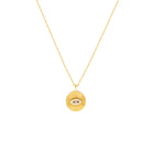 Gold necklace with a circular pendant on a white background