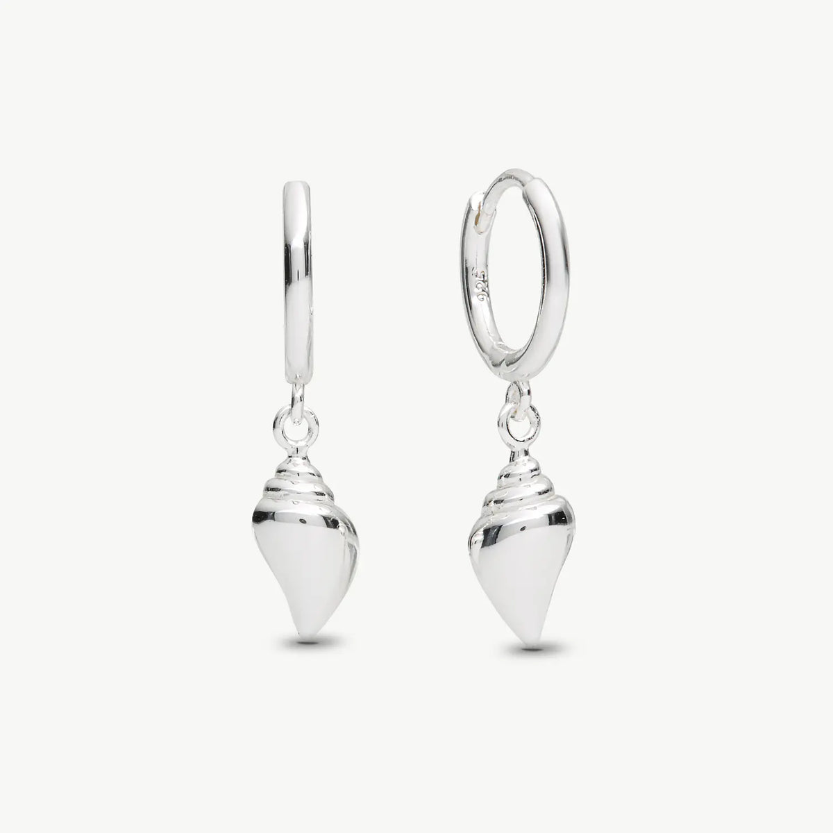 Conch Shell sterling Silver drop huggie earrings on cream background