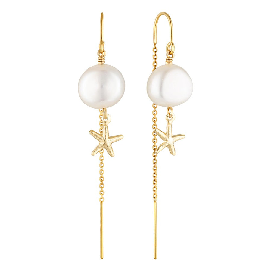 Pearl and starfish earrings with gold chains on a white background