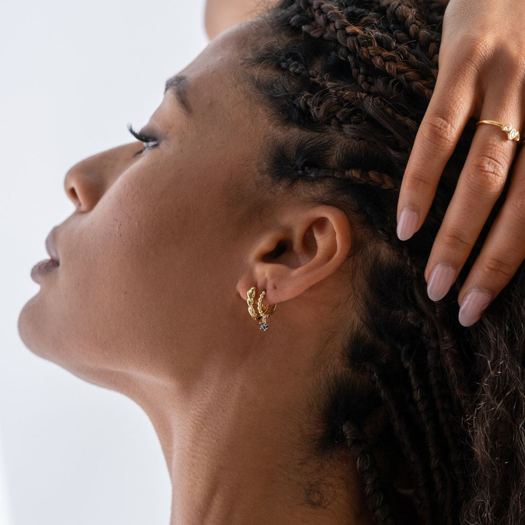 Gold-Aura Twist Huggie Hoop Earrings on model-Australian Jewellery Brand Bowerbird Jewels