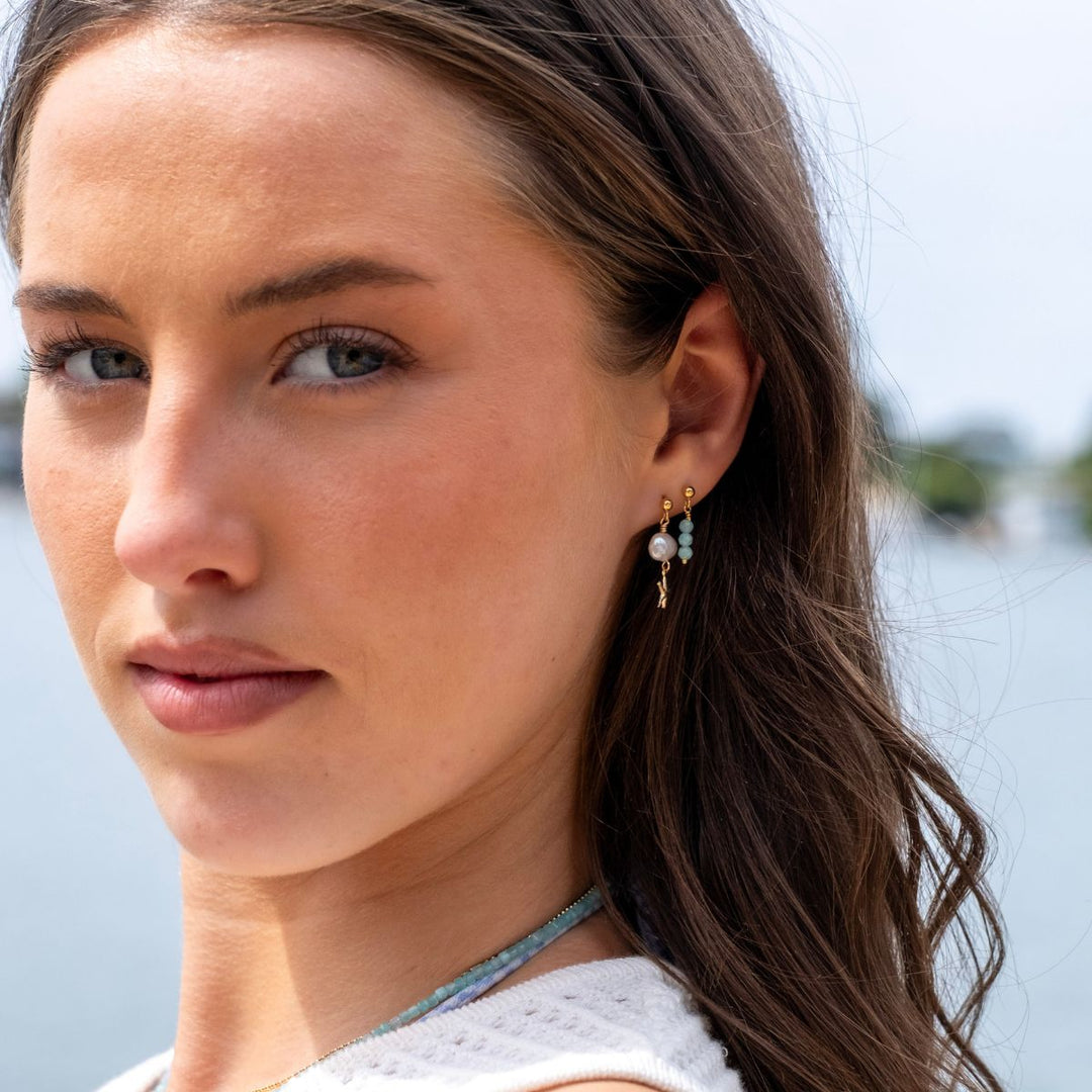 Gold-Luma Gold Filled Stud Earrings with Freshwater Pearl and Starfish Drop2 on model-Australian Jewellery Brand Bowerbird Jewels