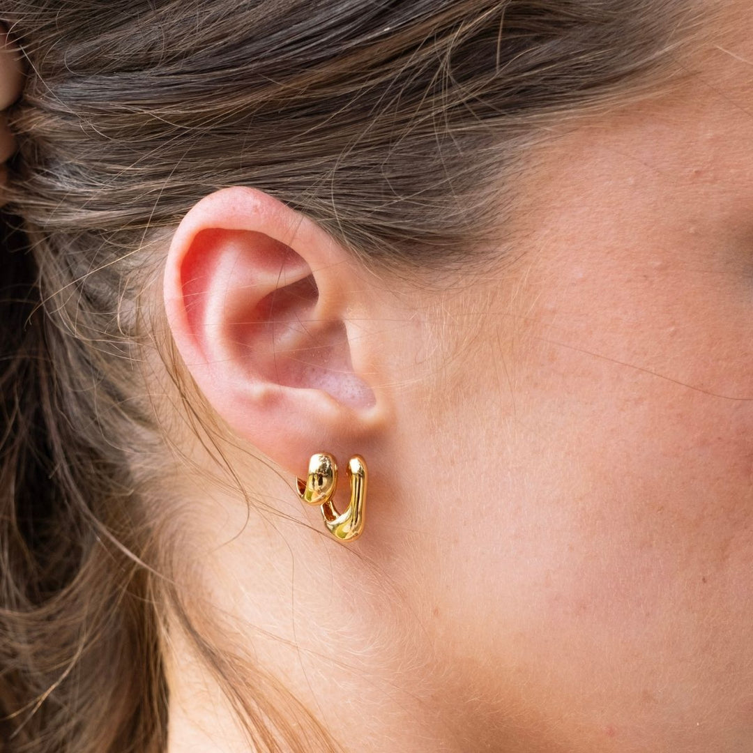 Gold-Wide Curved Polished Petite Huggies in Sterling Silver or Gold on model-Australian Jewellery Brand Bowerbird Jewels