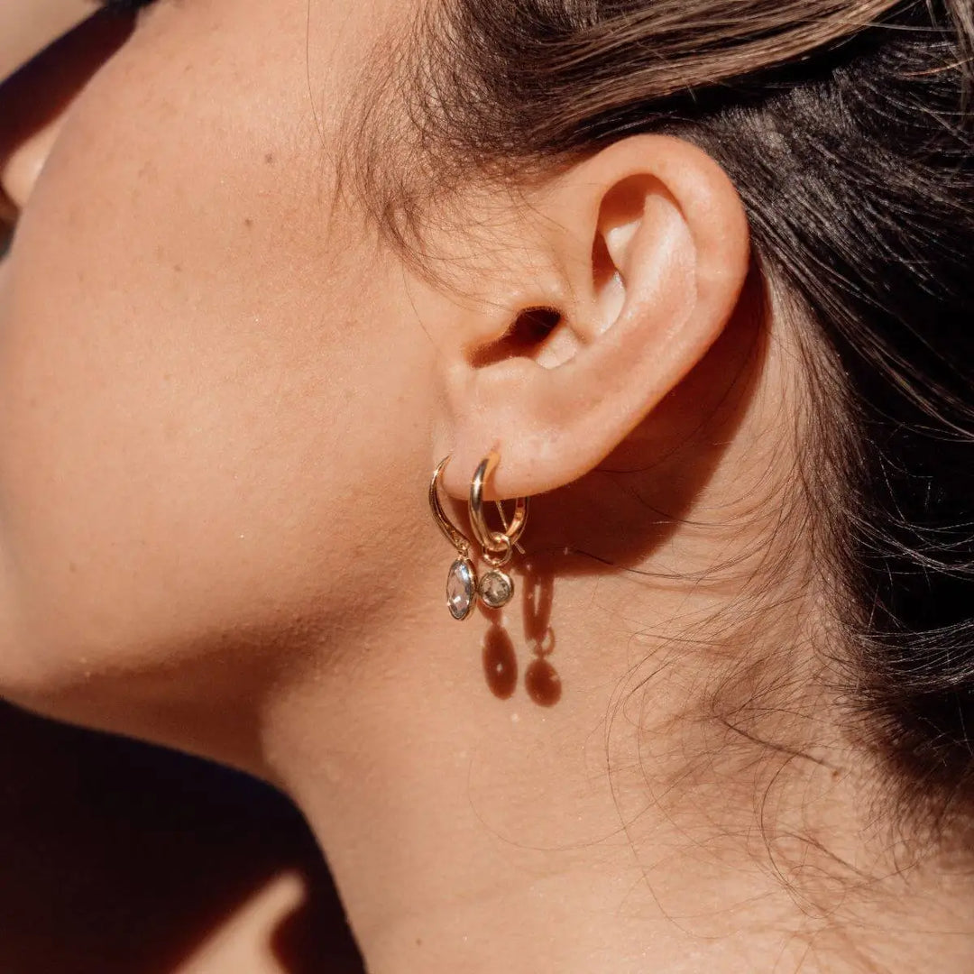 Marais Peridot Drop Huggie Earrings in 18K Gold Vermeil or Silver Gold 2 - on model- Australian Jewellery Brand Bowerbird Jewels