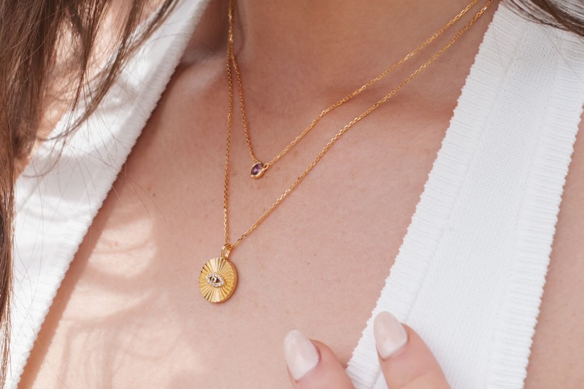 Omnis Necklace on model in gold. Bowerbird Jewels