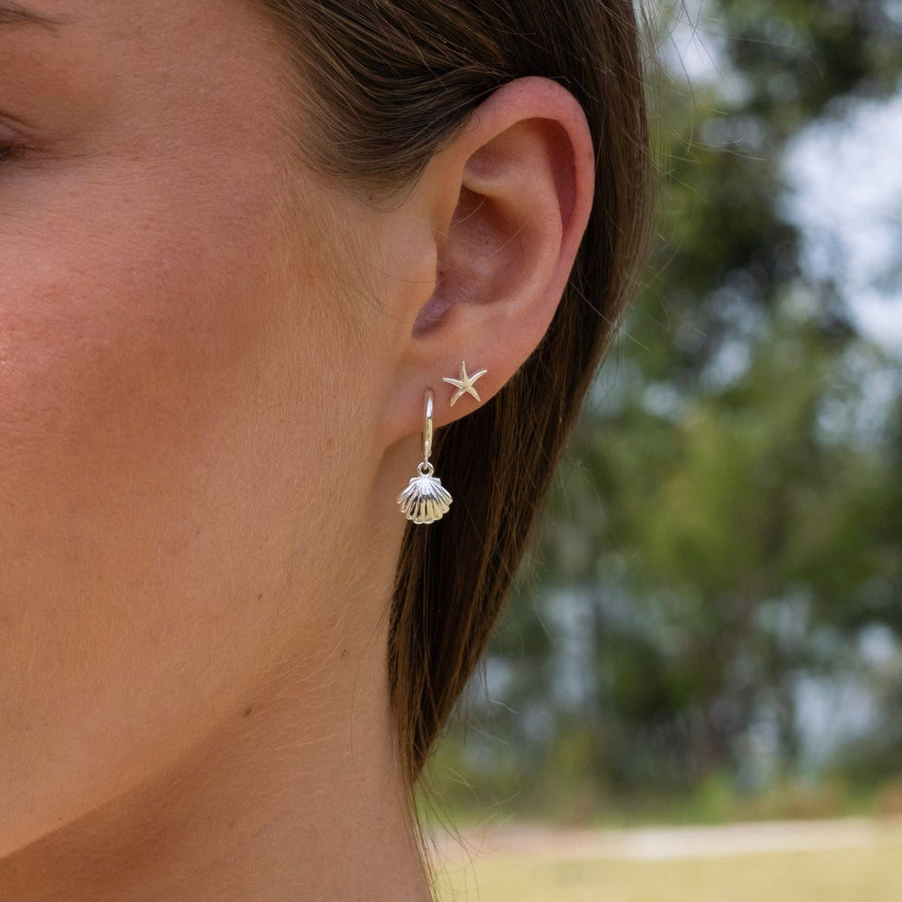 Silver-Sterling Silver Silver Huggie Earrings with Scallop Shell Charm on model-Australian Jewellery Brand Bowerbird Jewels