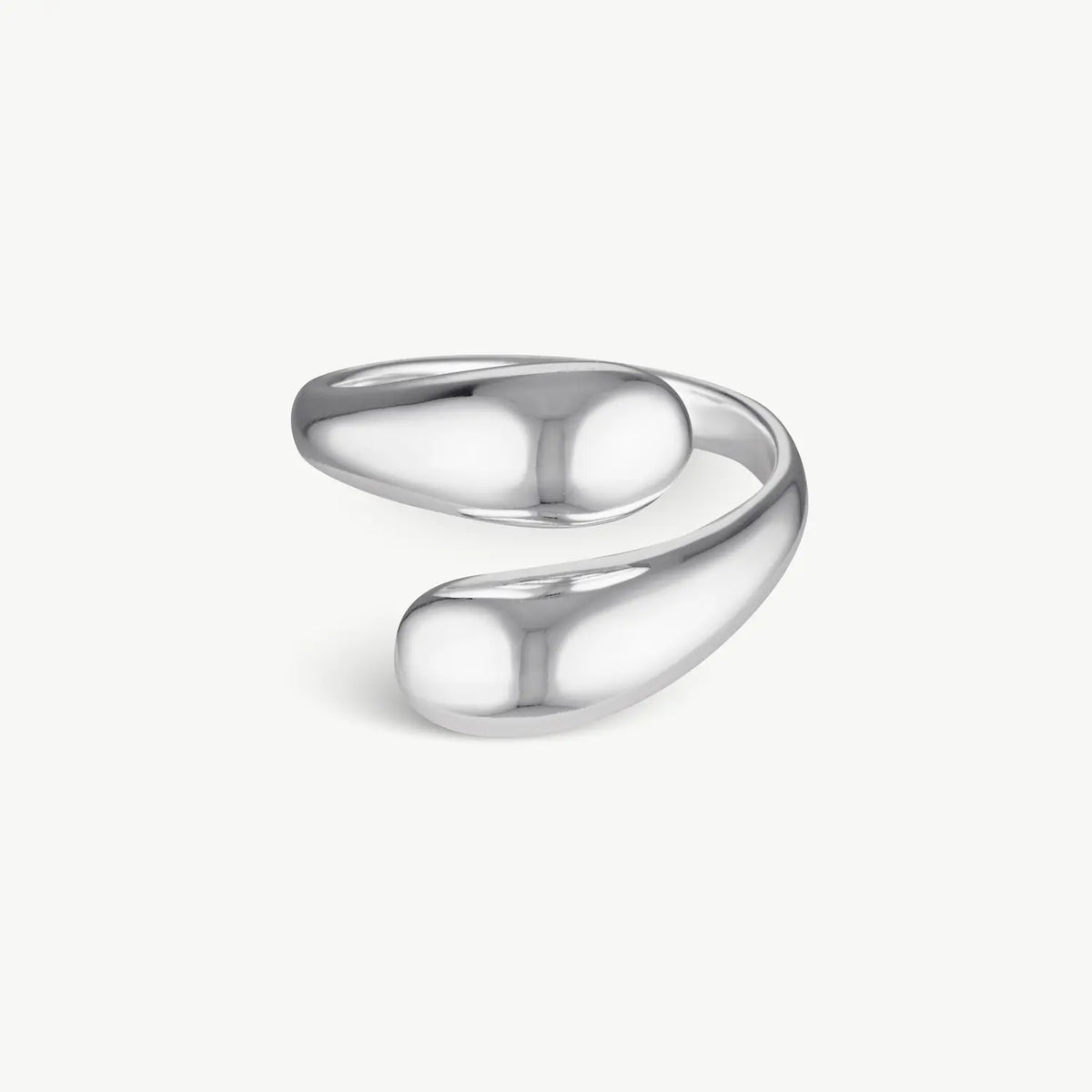 A polished silver open wrap ring with a smooth, organic curved design, shown on a clean off-white background.