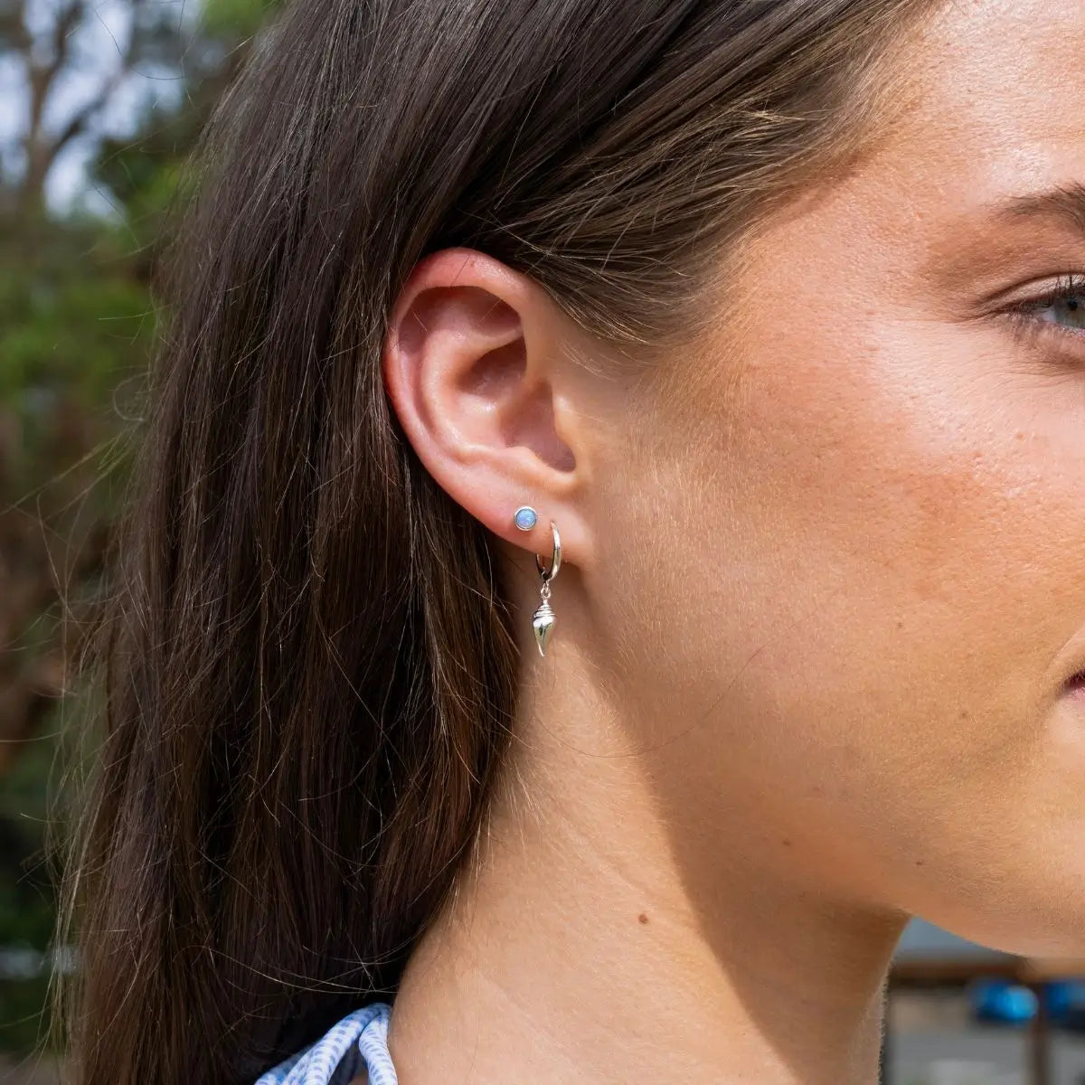Sterling Silver Huggie Earrings with Conch Shell Charm Silver 1 on model- Australian Jewellery Brand Bowerbird Jewels