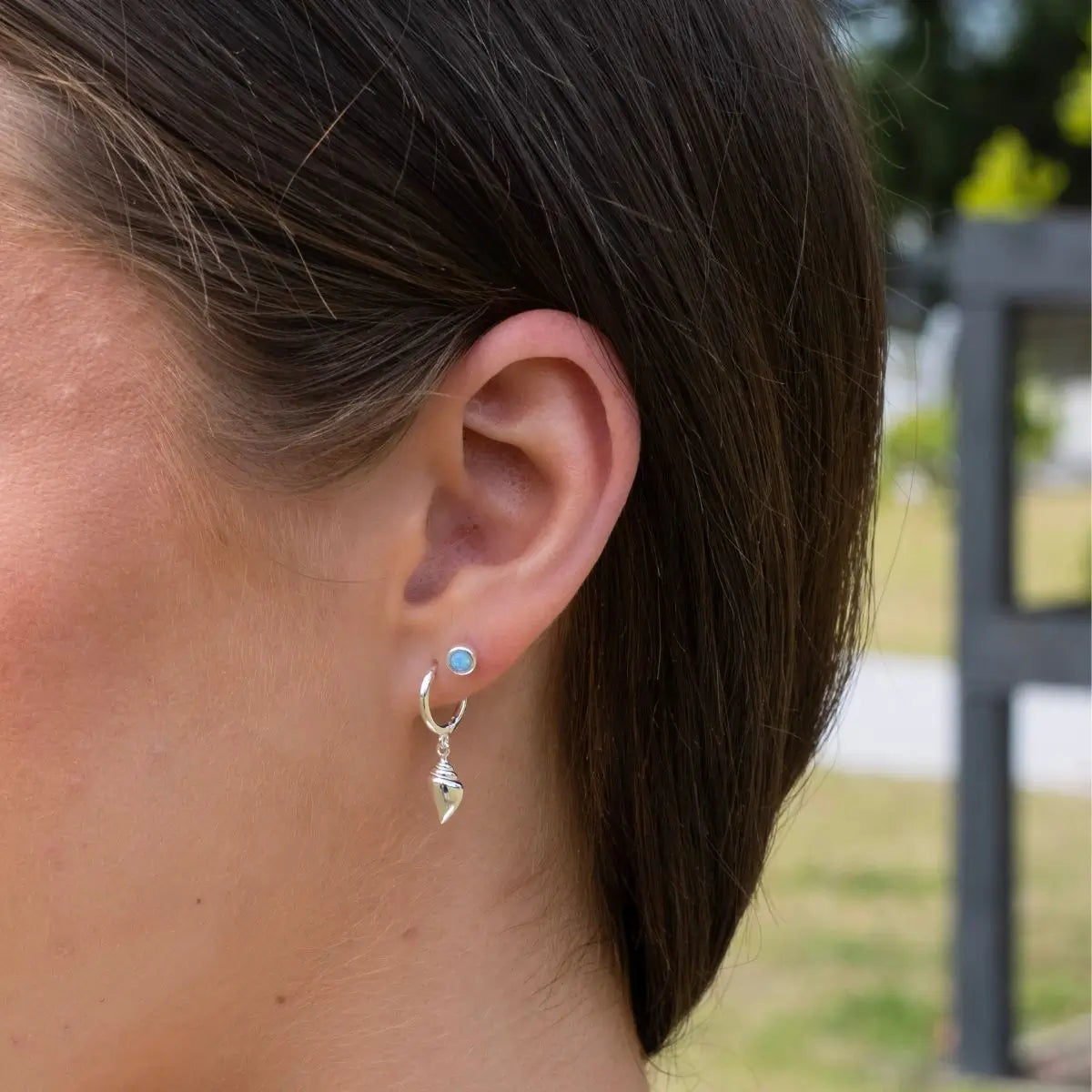 Sterling Silver Huggie Earrings with Conch Shell Charm Silver 3 on model- Australian Jewellery Brand Bowerbird Jewels