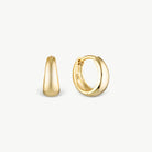 A pair of polished yellow gold huggie hoop earrings, one shown from a side profile and the other from a front-three-quarter angle, set against a clean off-white background.