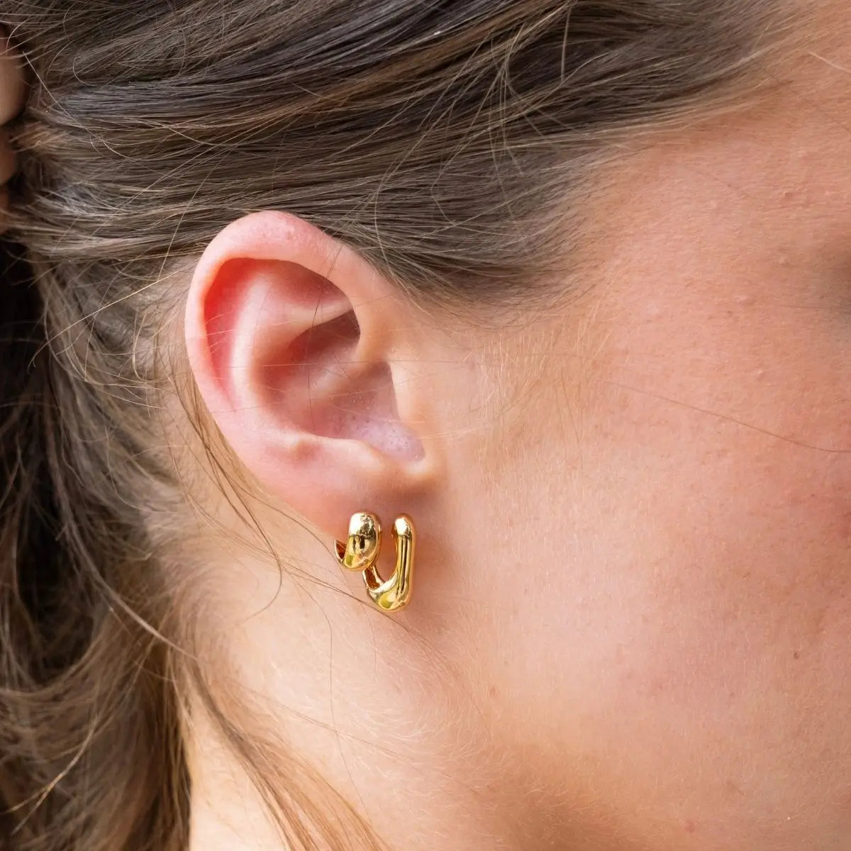 Wide Curved Polished Petite Huggies in Sterling Silver or Gold Gold 1 on model- Australian Jewellery Brand Bowerbird Jewels